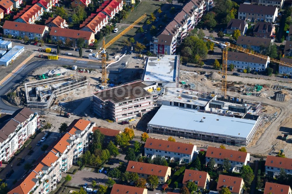 Hönow from the bird's eye view: Construction site for the new building city destrict center between of Schulstrasse and of Marderstrasse in Hoenow in the state Brandenburg, Germany