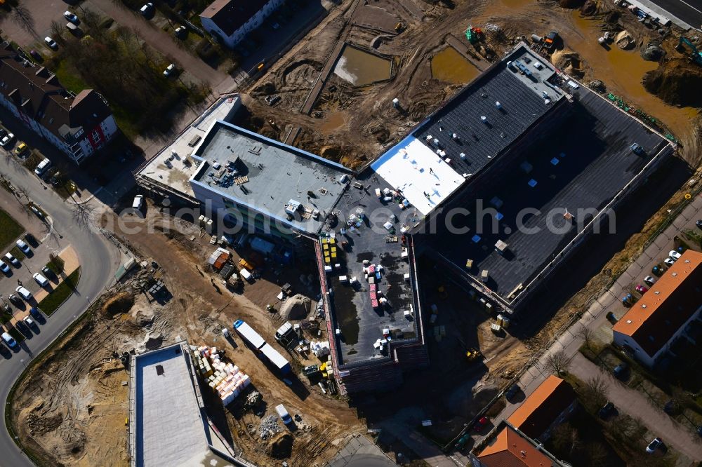 Hönow from above - Construction site for the new building city destrict center between of Schulstrasse and of Marderstrasse in Hoenow in the state Brandenburg, Germany