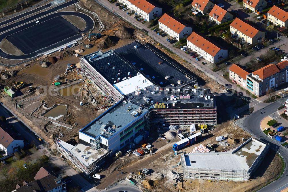 Hönow from above - Construction site for the new building city destrict center between of Schulstrasse and of Marderstrasse in Hoenow in the state Brandenburg, Germany