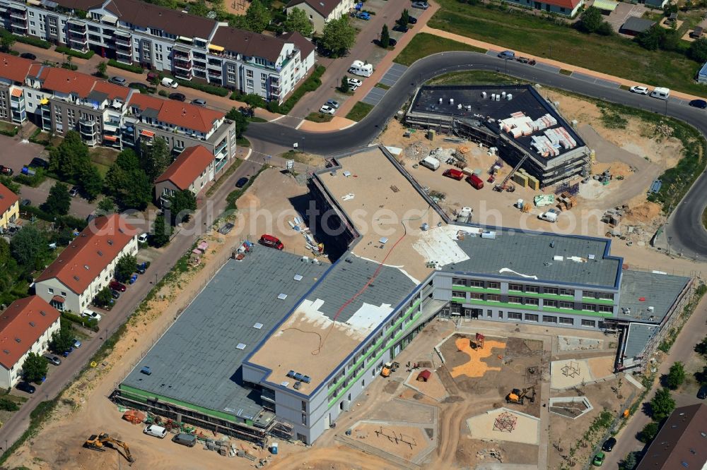 Hönow from above - Construction site for the new building city destrict center between of Schulstrasse and of Marderstrasse in Hoenow in the state Brandenburg, Germany