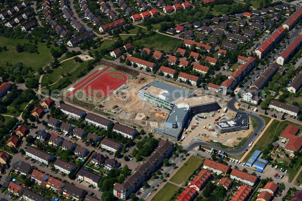 Hönow from above - Construction site for the new building city destrict center between of Schulstrasse and of Marderstrasse in Hoenow in the state Brandenburg, Germany