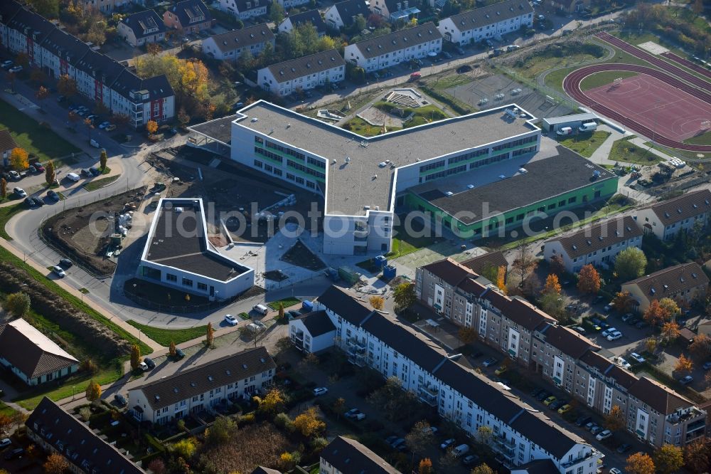 Hönow from above - Construction site for the new building city destrict center between of Schulstrasse and of Marderstrasse in Hoenow in the state Brandenburg, Germany