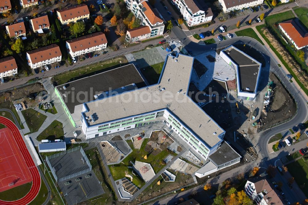 Hönow from above - Construction site for the new building city destrict center between of Schulstrasse and of Marderstrasse in Hoenow in the state Brandenburg, Germany