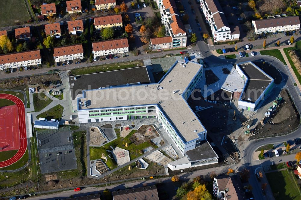 Hönow from the bird's eye view: Construction site for the new building city destrict center between of Schulstrasse and of Marderstrasse in Hoenow in the state Brandenburg, Germany