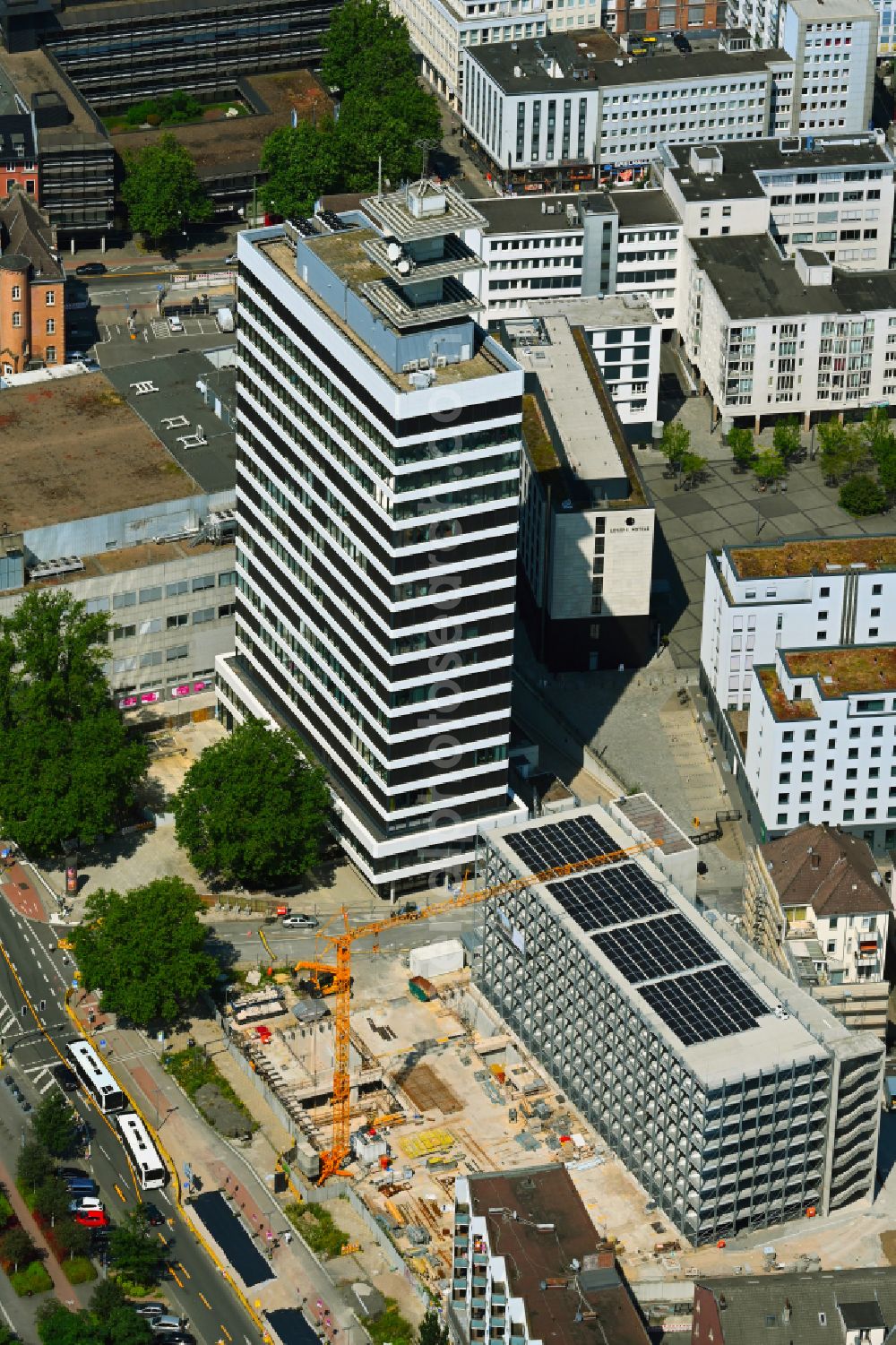 Bielefeld from above - Construction site for the new parking garage on street Kavalleriestrasse - Philipp Reis Platz in the district Mitte in Bielefeld in the state North Rhine-Westphalia, Germany