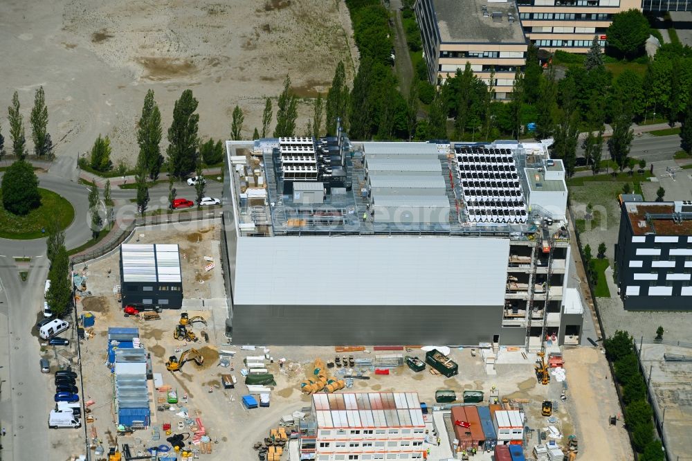 Aerial photograph Aschheim - Construction site for the new parking garage Karl-Hammerschmidt-Strasse corner Dywidagstrass in the district Dornach in Aschheim in the state Bavaria, Germany