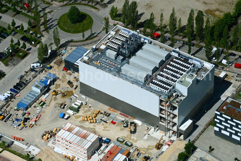 Aschheim from above - Construction site for the new parking garage Karl-Hammerschmidt-Strasse corner Dywidagstrass in the district Dornach in Aschheim in the state Bavaria, Germany