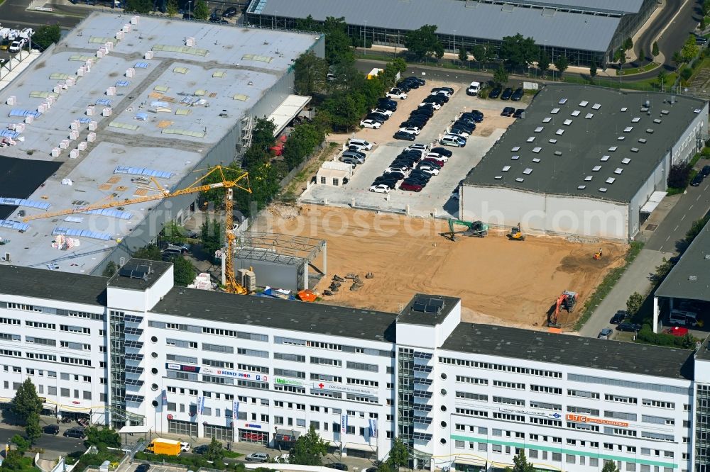 Berlin from the bird's eye view: Construction site for the new parking garage Meeraner Strasse - Rhinstrasse in the district Marzahn in Berlin, Germany