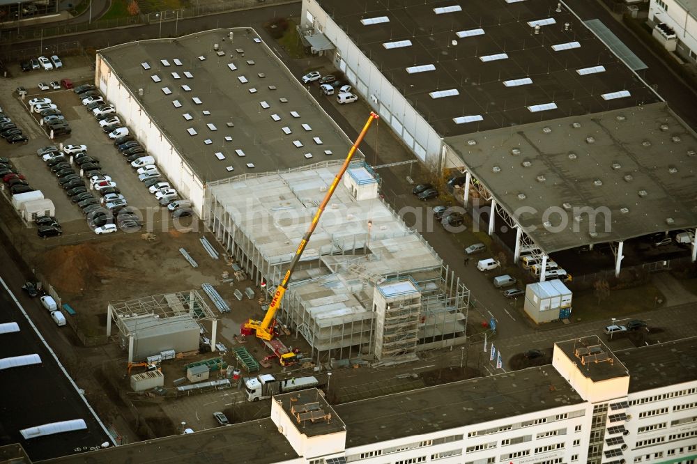 Berlin from the bird's eye view: Construction site for the new parking garage Meeraner Strasse - Rhinstrasse in the district Marzahn in Berlin, Germany