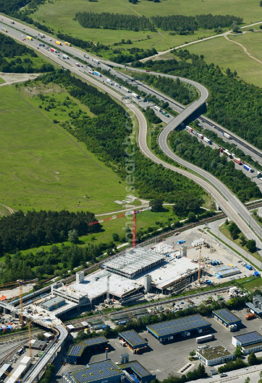 Aerial image München - Construction site for the new parking garage on street Werner-Heisenberg-Allee in Munich in the state Bavaria, Germany