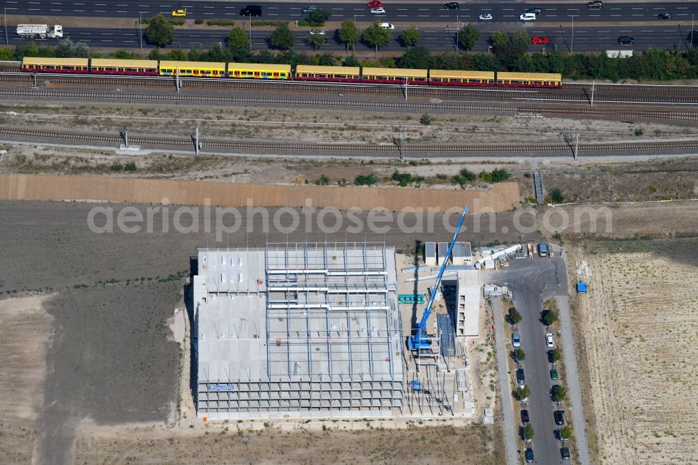 Berlin from the bird's eye view: Construction site for the new parking garage on Wagner-Regeny-Strasse in the district Adlershof in Berlin, Germany