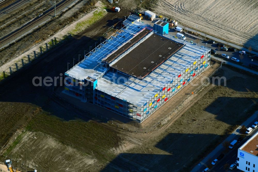 Berlin from the bird's eye view: Construction site for the new parking garage on Wagner-Regeny-Strasse in the district Adlershof in Berlin, Germany