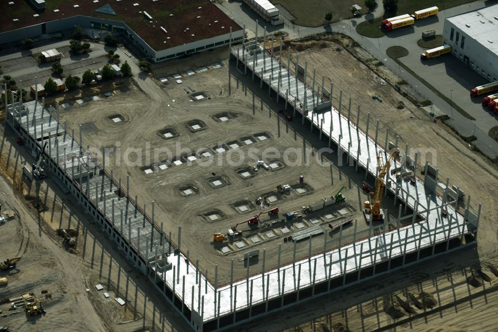 Trebbin from the bird's eye view: Construction site for the new building of Poco - Domaene- Zentrallager in Trebbin in the state Brandenburg