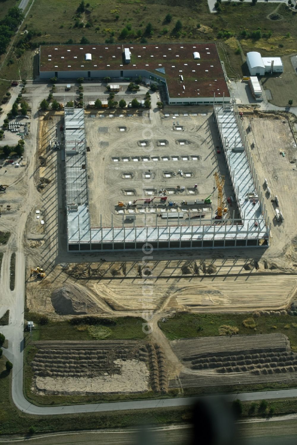 Aerial photograph Trebbin - Construction site for the new building of Poco - Domaene- Zentrallager in Trebbin in the state Brandenburg