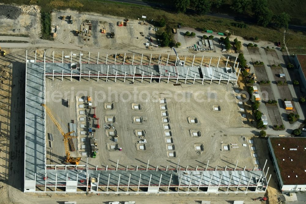 Trebbin from above - Construction site for the new building of Poco - Domaene- Zentrallager in Trebbin in the state Brandenburg