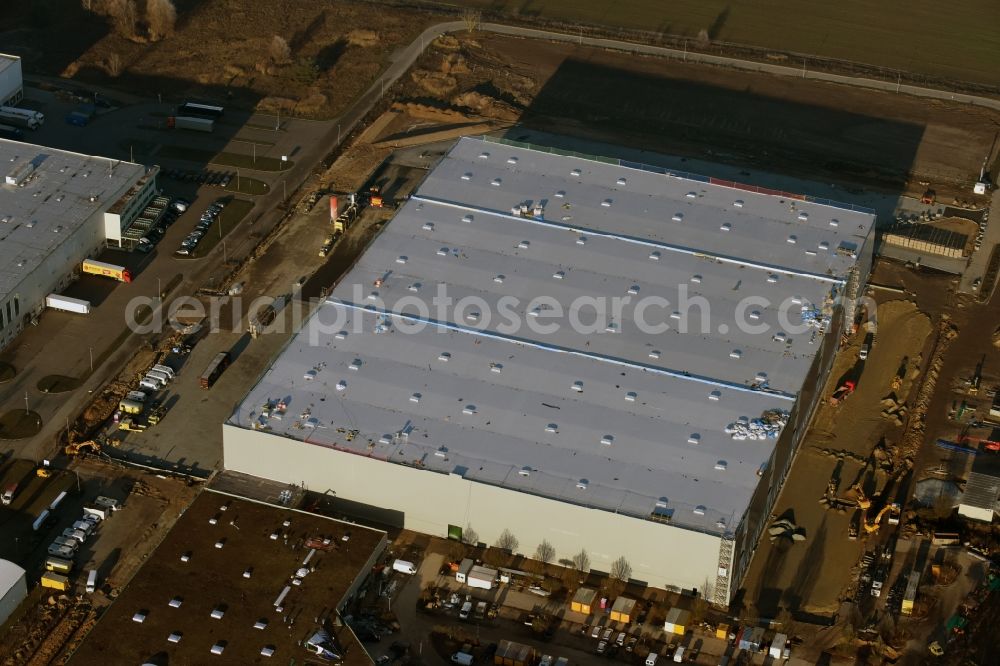 Trebbin from above - Construction site for the new building of Poco - Domaene- Zentrallager in Trebbin in the state Brandenburg