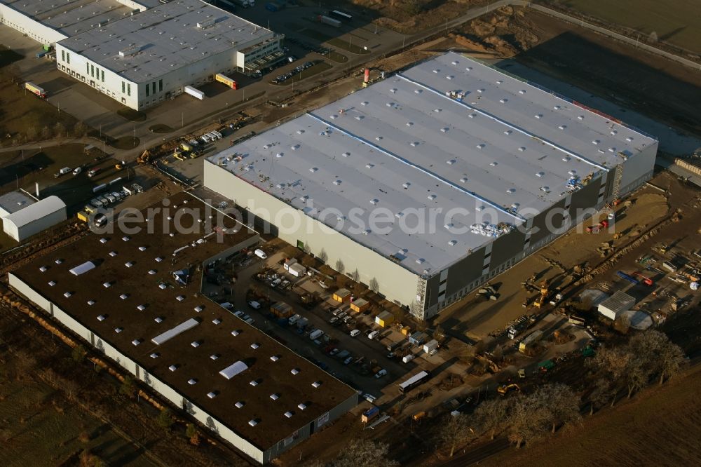 Trebbin from the bird's eye view: Construction site for the new building of Poco - Domaene- Zentrallager in Trebbin in the state Brandenburg