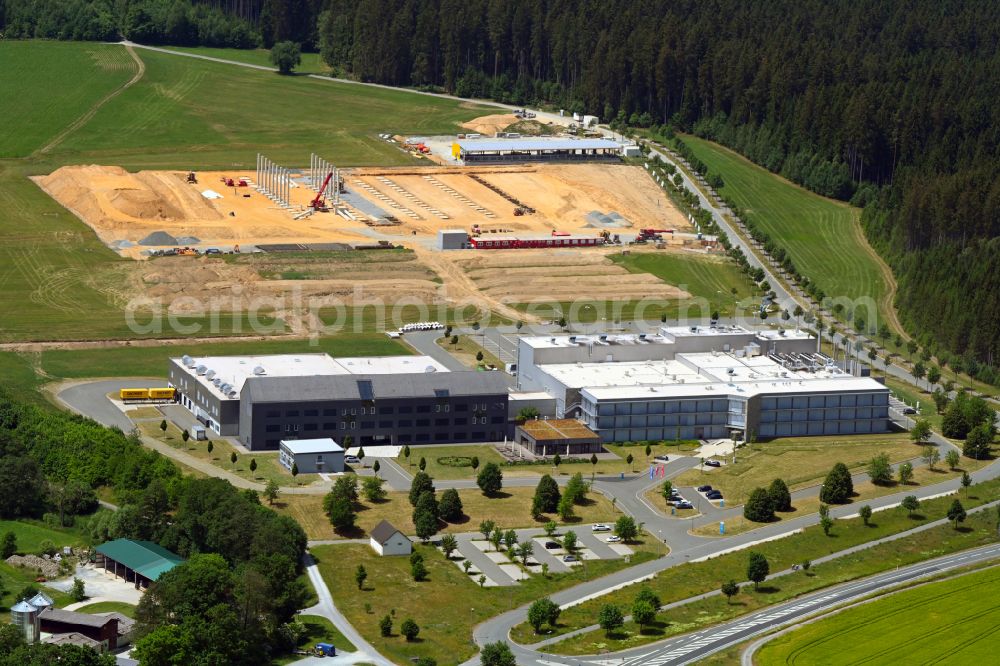 Ottogrün from above - Construction site for the new building eines Postverteilzentrums on street Hermann-Staudinger-Strasse in Ottogruen in the state Bavaria, Germany