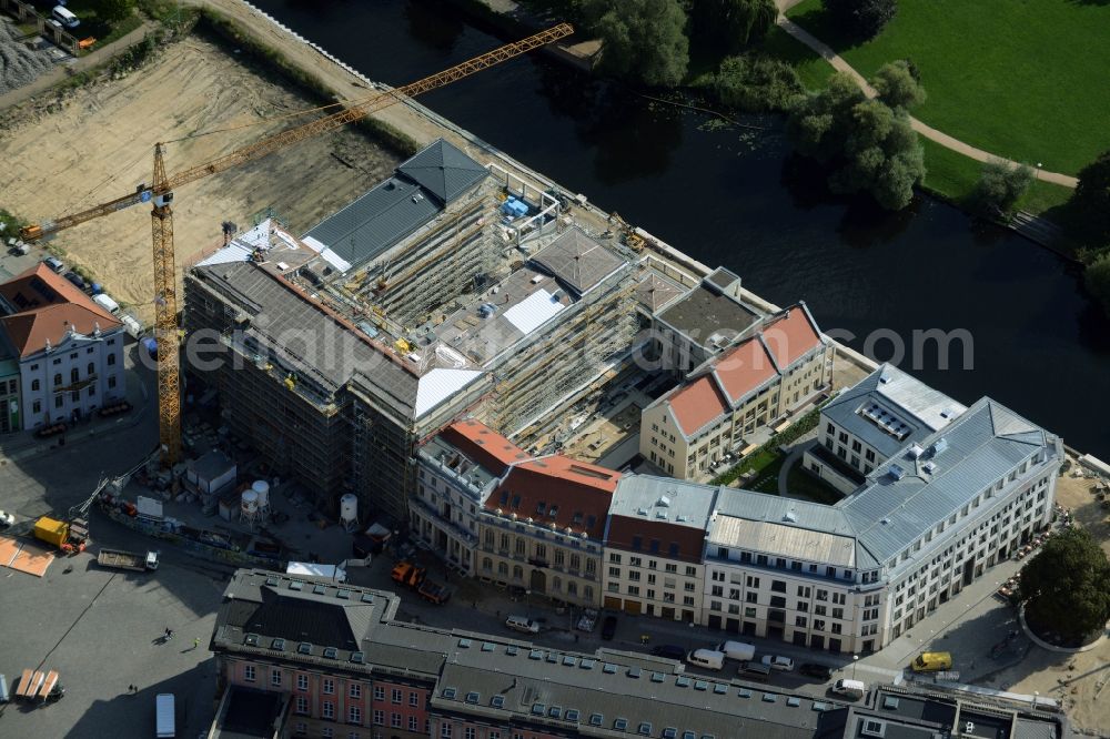 Potsdam from above - Construction site for the new building of the quarter HQ Humboldt in Potsdam in the state of Brandenburg. The Humboldt quarter is located on the riverbank of the Alte Fahrt and will include offices and residential apartments