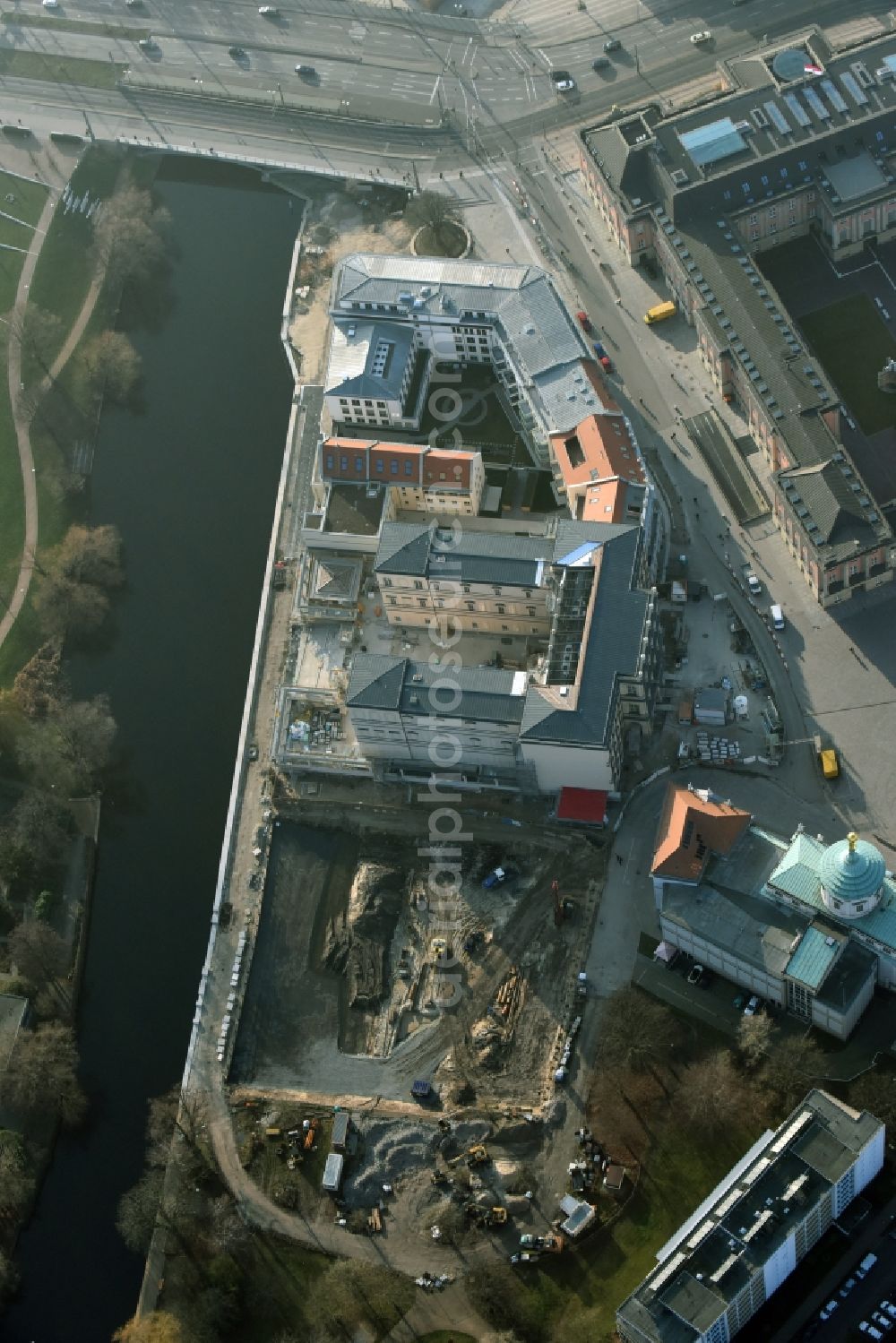 Potsdam from above - Construction site for the new building of the quarter HQ Humboldt in Potsdam in the state of Brandenburg. The Humboldt quarter is located on the riverbank of the Alte Fahrt and will include offices and residential apartments