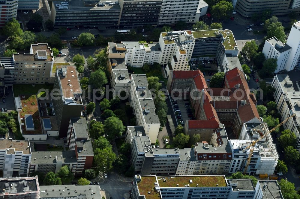 Aerial image Berlin - Construction site for the new building of a terraced building of the project Inside-Outside Berlin with luxurious apartments and penthouses in Berlin, Germany