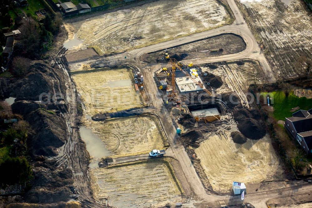 Aerial image Gelsenkirchen - Construction site for the new building of row houses and a residential area in the South of Almastrasse in Gelsenkirchen in the state of North Rhine-Westphalia. The area is being developed by Vista Reihenhaus GmbH & Co.KG