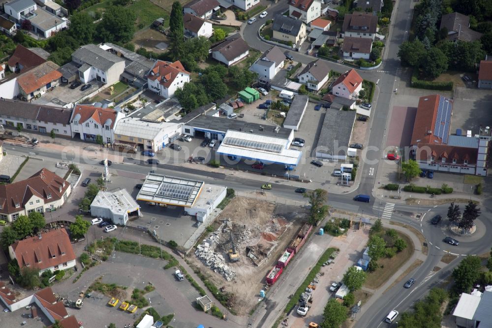 Nieder-Olm from the bird's eye view: Construction site for the new building of a REWE- market in Nieder-Olm in the state Rhineland-Palatinate, Germany