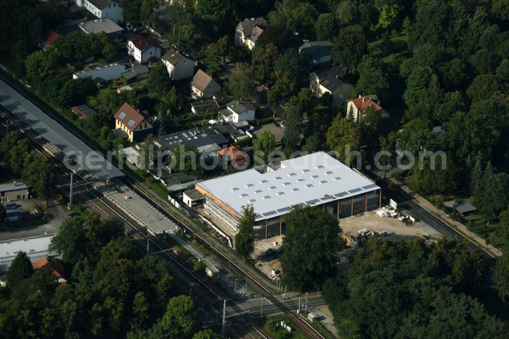 Aerial photograph Zeuthen - Construction site for the new building of a REWE-Supermarket in the Goethestrasse corner Forststrasse in Zeuthen in the state Brandenburg. Architects are the Koch Architekten Duesseldorf