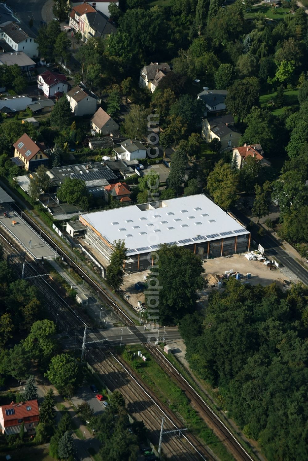 Zeuthen from above - Construction site for the new building of a REWE-Supermarket in the Goethestrasse corner Forststrasse in Zeuthen in the state Brandenburg. Architects are the Koch Architekten Duesseldorf