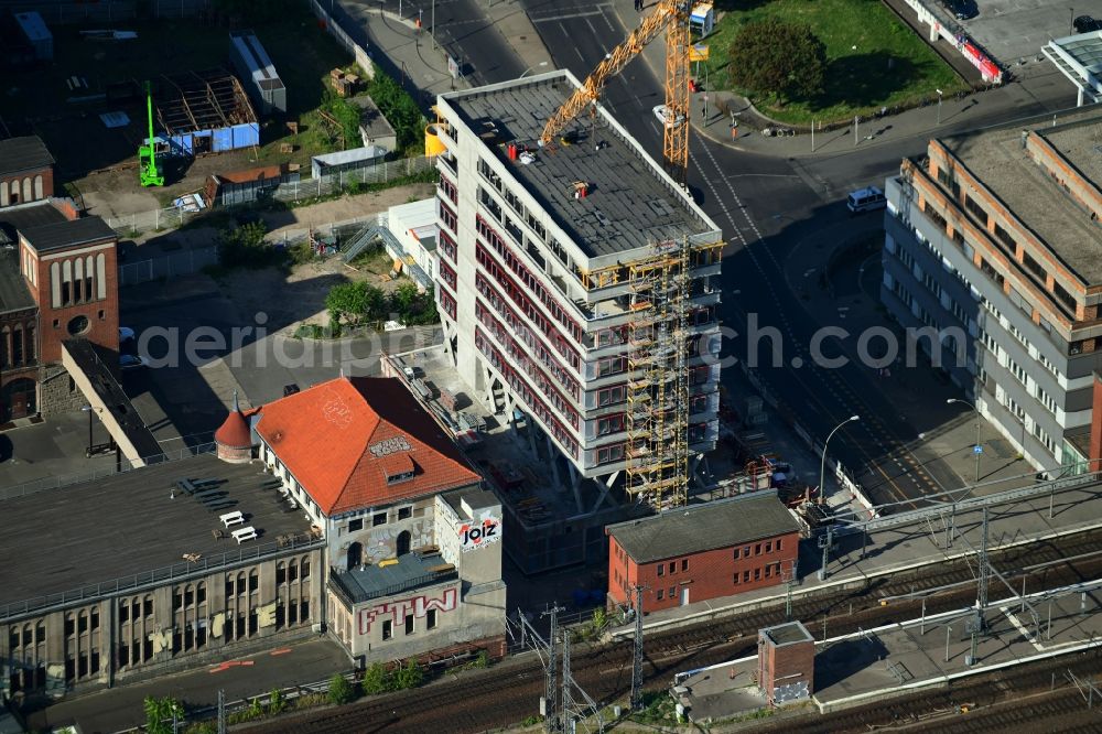 Berlin from the bird's eye view: Construction site for the new building of Rosa-Luxemburg-Stiftung Am Postbahnhof in the district Friedrichshain in Berlin, Germany