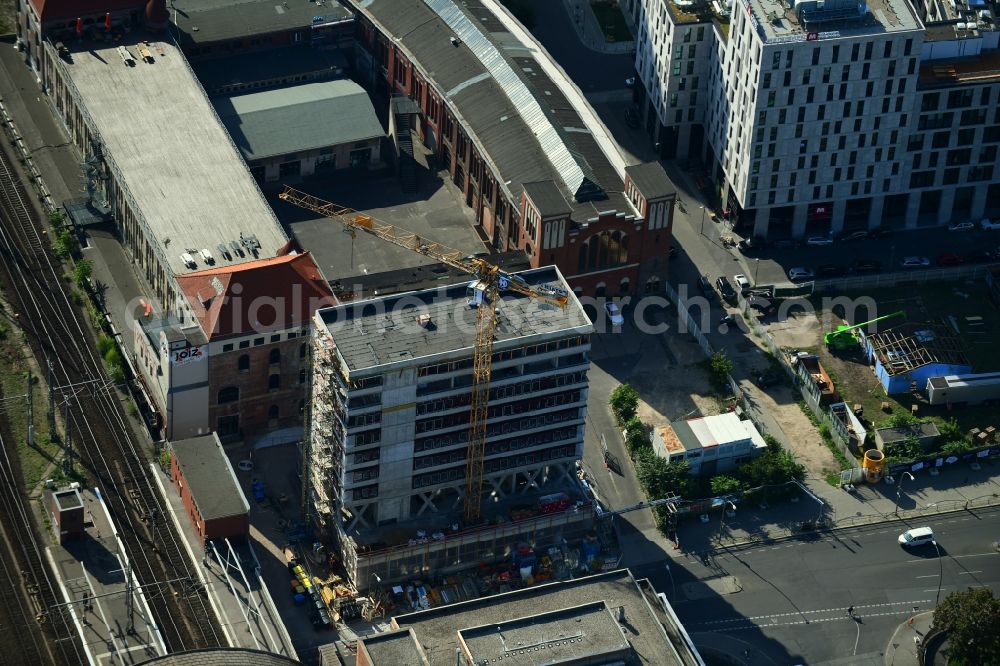 Berlin from the bird's eye view: Construction site for the new building of Rosa-Luxemburg-Stiftung Am Postbahnhof in the district Friedrichshain in Berlin, Germany