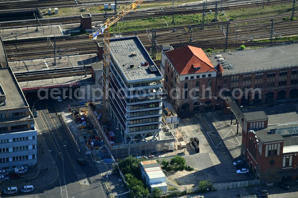 Berlin from the bird's eye view: Construction site for the new building of Rosa-Luxemburg-Stiftung Am Postbahnhof in the district Friedrichshain in Berlin, Germany