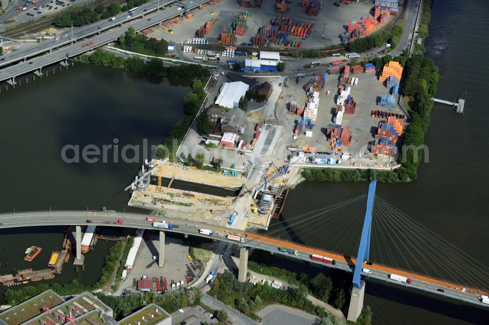 Hamburg from the bird's eye view: Construction site to build the new Rugenberger lock in Hamburg. Construction company is the August PRIEN GmbH & Co. KG