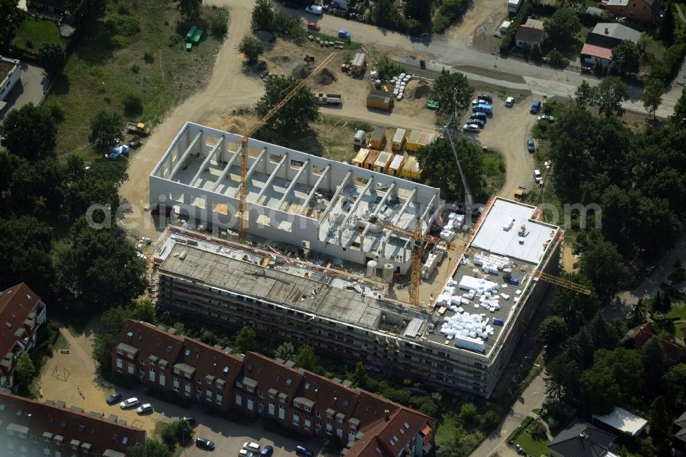 Aerial photograph Oranienburg - Construction site for the new building of a primary school in Oranienburg in the state Brandenburg. The school is being built on the corner of Koesener Strasse and Jenaer Strasse. The compound will include two buildings - the school and a sport hall