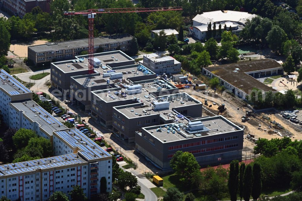 Berlin from the bird's eye view: New construction site of the school building Gymnasium with Sporthalle on street Erich-Kaestner-Strasse - Peter-Huchel-Strasse in the district Hellersdorf in Berlin, Germany