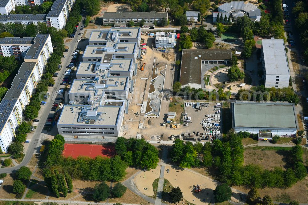 Berlin from the bird's eye view: New construction site of the school building Gymnasium with Sporthalle on street Erich-Kaestner-Strasse - Peter-Huchel-Strasse in the district Hellersdorf in Berlin, Germany