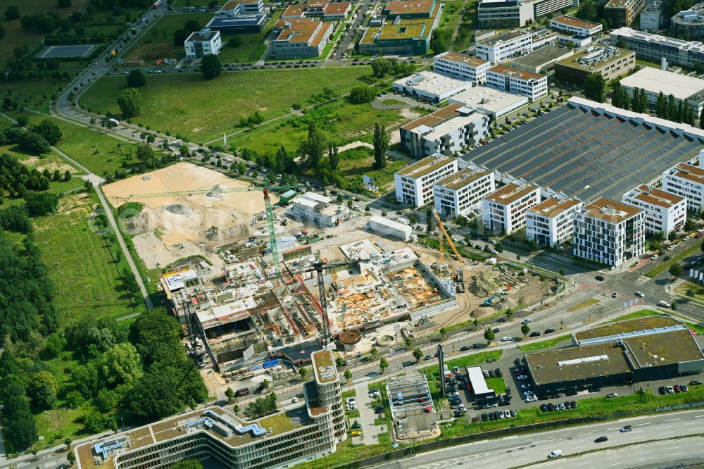 Berlin from the bird's eye view: New construction site of the school building a community school on street Hermann-Dorner-Allee - Eisenhutweg in the district Adlershof in Berlin, Germany