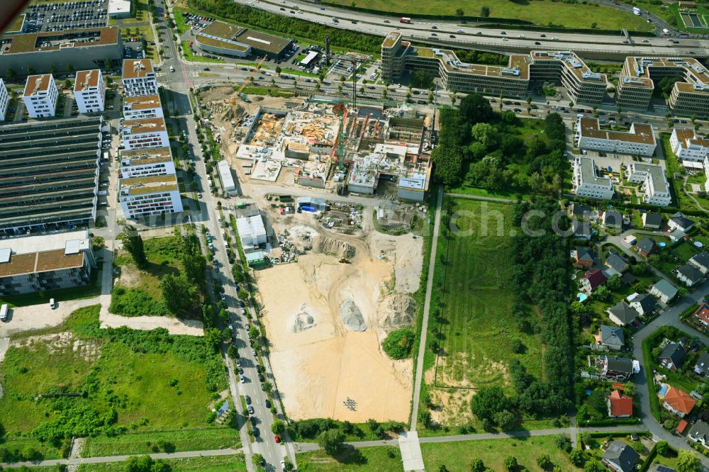 Berlin from the bird's eye view: New construction site of the school building a community school on street Hermann-Dorner-Allee - Eisenhutweg in the district Adlershof in Berlin, Germany