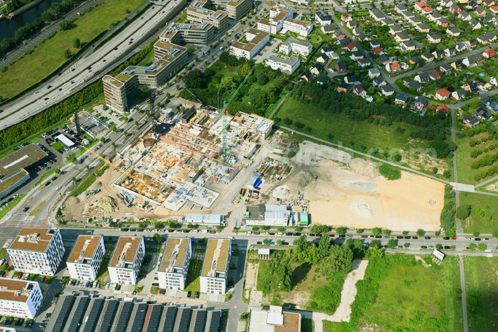 Berlin from the bird's eye view: New construction site of the school building a community school on street Hermann-Dorner-Allee - Eisenhutweg in the district Adlershof in Berlin, Germany