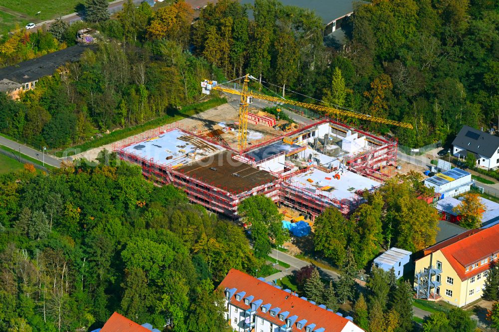 Werneuchen from the bird's eye view: New construction site of the school building Grundschule Im Rosenpark on street Goldregenstrasse in Werneuchen in the state Brandenburg, Germany