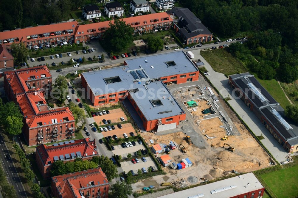 Potsdam from the bird's eye view: New construction site of the school building of Grundschule Rote Kaserne Ost on Fritz-von-of-Lancken-Strasse - Graf-von-Schwerin-Strasse in Potsdam in the state Brandenburg, Germany