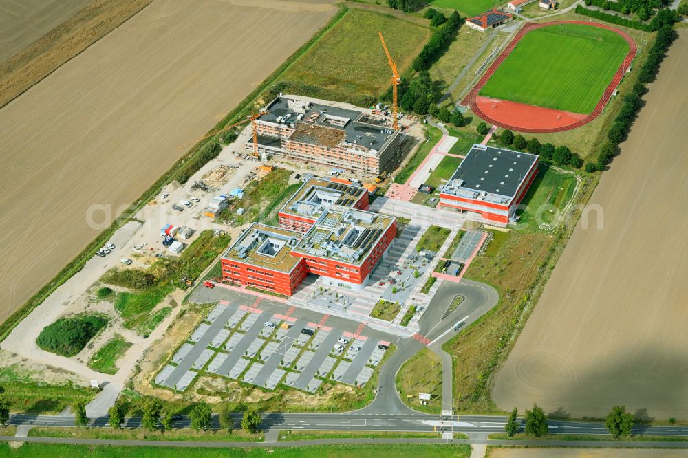 Altlandsberg from the bird's eye view: New construction site of the school building Neuer Schulcampus on street Fredersdorfer Chaussee in Altlandsberg in the state Brandenburg, Germany