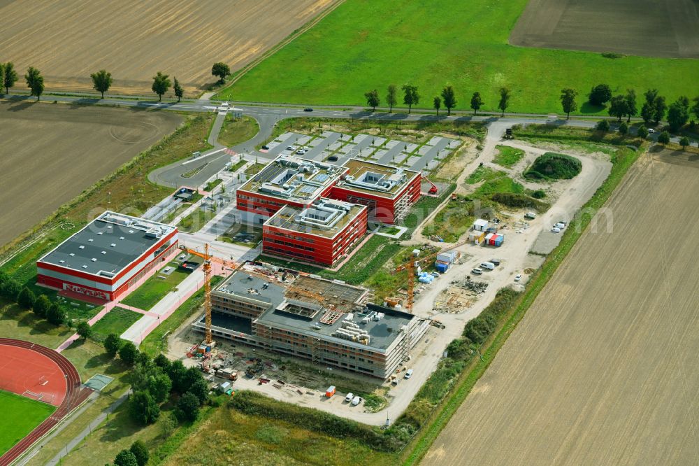 Altlandsberg from the bird's eye view: New construction site of the school building Neuer Schulcampus on street Fredersdorfer Chaussee in Altlandsberg in the state Brandenburg, Germany