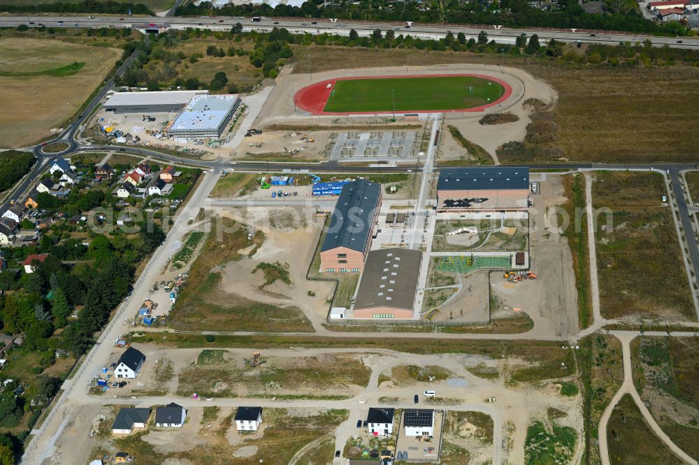 Neuenhagen from the bird's eye view: New construction site of the school building Schulcampus Gruscheweg in Neuenhagen in the state Brandenburg, Germany