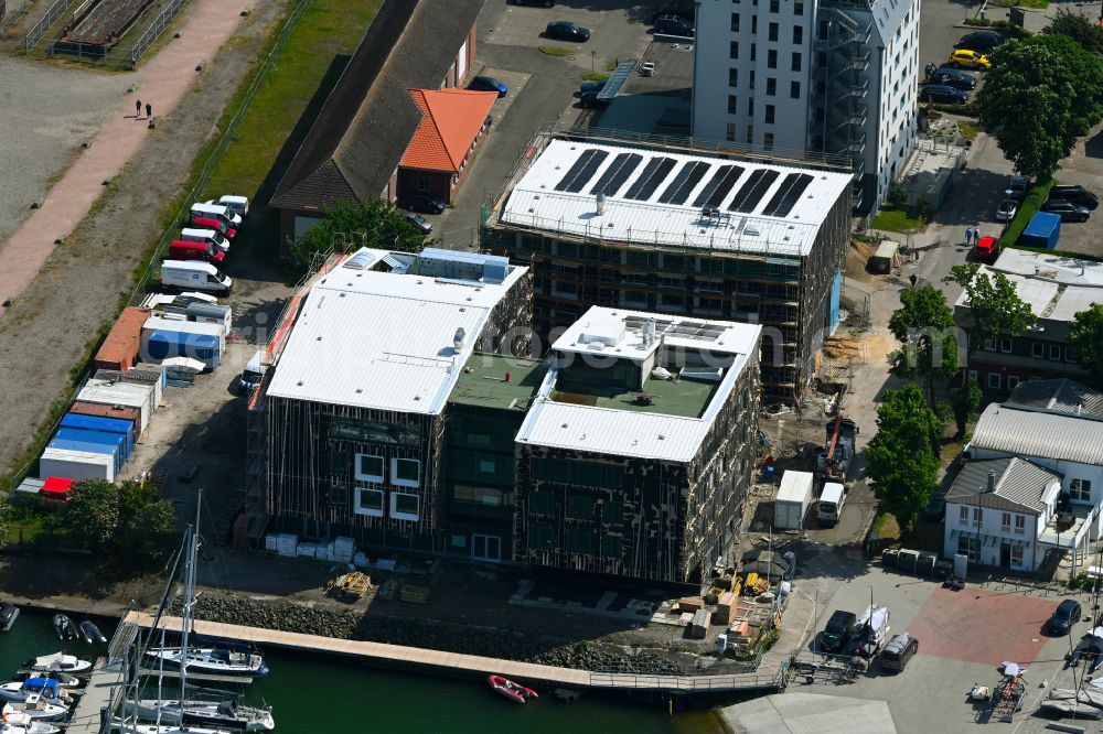 Aerial photograph Rostock - Construction site for the new school building of the Yachthafen sports school in the Warnemuende district of Rostock on the Baltic Sea coast in the state of Mecklenburg-Western Pomerania, Germany