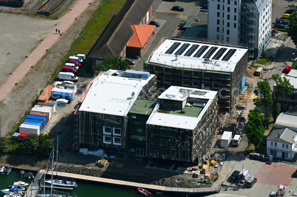 Rostock from above - Construction site for the new school building of the Yachthafen sports school in the Warnemuende district of Rostock on the Baltic Sea coast in the state of Mecklenburg-Western Pomerania, Germany