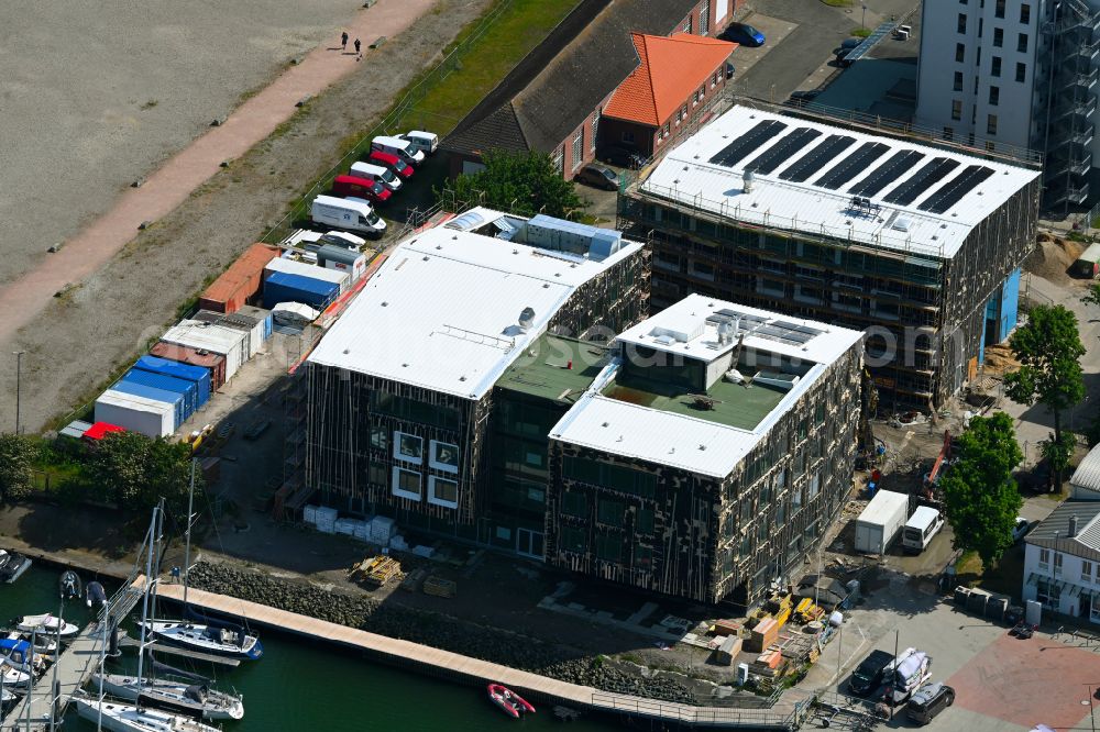 Rostock from the bird's eye view: Construction site for the new school building of the Yachthafen sports school in the Warnemuende district of Rostock on the Baltic Sea coast in the state of Mecklenburg-Western Pomerania, Germany