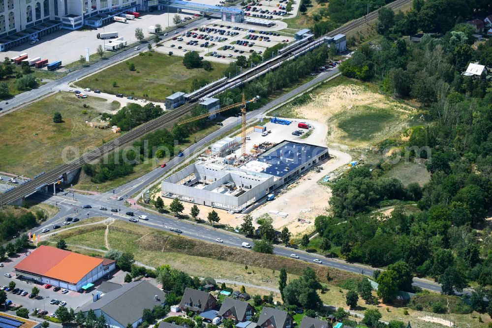 Aerial image Falkensee - Construction site for the new building of the indoor swimming pool on street Seegefelder Strasse in Falkensee in the state Brandenburg, Germany