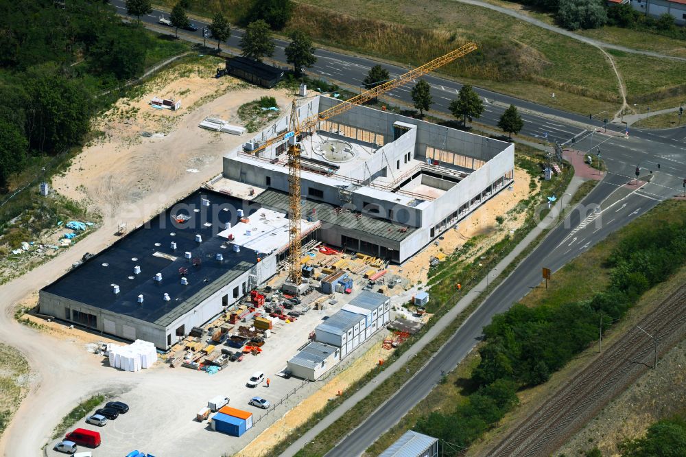 Aerial image Falkensee - Construction site for the new building of the indoor swimming pool on street Seegefelder Strasse in Falkensee in the state Brandenburg, Germany