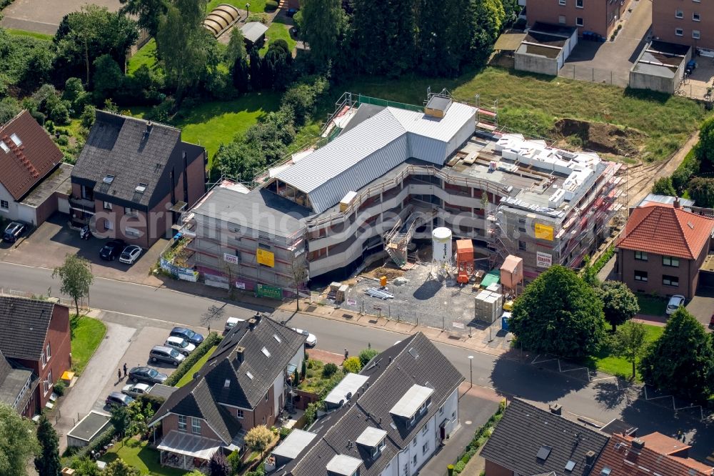 Aerial image Haltern am See - Construction site to build a new elderly accessible housing project of the housing cooperative LiNa - live in neighborhood e.V. on Henn Perpetual way in Haltern am See in the state of North Rhine-Westphalia